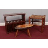 A trio of occasional furniture. Mahogany magazine rack, two stools.