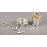A small collection of silver items. To include silver gilt christening cup, assayed for Sheffield,
