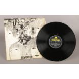 The Beatles Revolver 33½LP, with original dust jacket. Yellow and black Parlophone label Serial