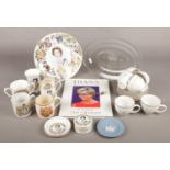 A box of commemorative wares. Includes Diana book, Golden Jubilee teawares, Coalport cabinet