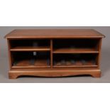 An Ercol golden dawn TV cabinet. (50cm x 111cm)