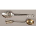 Two silver spoons. Includes rifle souvenir spoon assayed Sheffield 1921 by Walter Trickett and a