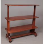 A mahogany metamorphic table/dumb waiter.