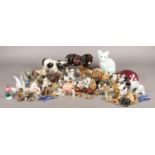 A large quantity of mainly ceramic animal figures. To include several examples from Wade.