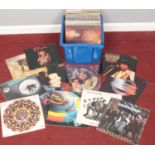 A box of LP records. Including Bon Jovi limited edition interview picture disc, ZZ Top, Madness,