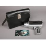 A Rank Aldis 815 Super 8 Movie Camera. Comes with case and original instruction booklet.