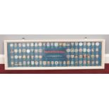 A framed picture of Esso Collectors football club badges (76 in total) H: 22cm, W: 83cm.