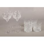 A collection of Stuart cut crystal glass wares. Four tumblers, four hock wine glasses.