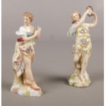 A pair of Rudolstadt Volkstedt porcelain figures of ladies dancing. 13 cm height.