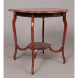 A Mahogany two tier window table raised on cabriole legs H: 71cm, W: 69cm.