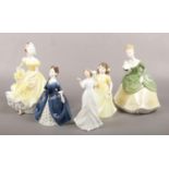 Five Royal Doulton figures of ladies and girls; HN2379, HN2385, HN3889, HN3393 and HN2312.