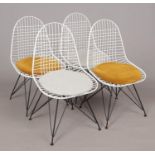 Four metal retro style chairs.