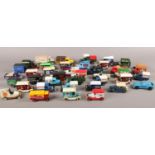 A box of die cast advertising vehicles. Corgi, Matchbox etc