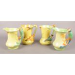Four Burgess & Leigh Burleigh Ware ceramic jugs decorated with bird handles. Two minor chips to foot