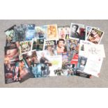 A collection of film memorabilia. Including lobby cards, some signed.