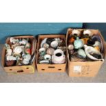 Three boxes of miscellaneous. Including large ceramic blue & white charger, large decorative