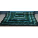 A 1960-1970s Scandinavian Rya blue ground wool rug, 300cm x 195cm