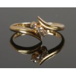 An 18ct Gold and three (1/32ct) stone diamond ring. Size P½. Total weight: 3.26g