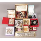 A collection of boxed costume jewellery. To include brooches and rings, including Swarovski and