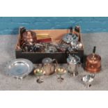 A box of metalwares. Including copper teapots, silver plate teawares, trays, etc.