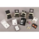 A collection of boxed costume jewellery. necklaces, earrings, rings.