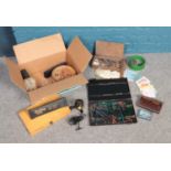A box of assorted fishing equipment. To include a Abu Garcia gold Max Mk2 507, a Garcia Mitchell