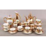 Two Bavarian part coffee sets, with displaying transfer prints of Austria and figures. Includes cups