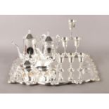 A collection of silver plated items. To include a box set of six wine goblets, and four piece coffee