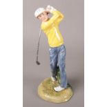 A Royal Doulton ceramic golfing figurine. 'Teeing off' HN3276.