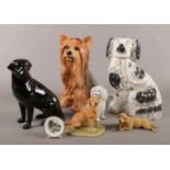 A collection of ceramic dog figurines. Beswick, Border Fine Arts etc damage/repair to Beswick dog