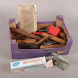 A box of assorted jewellery tools. Including ring stretcher, pliers, small anvil etc.