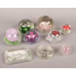 A box of glass paperweights.