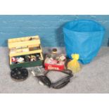 An assortment of sea fishing equipment. To include a tackle box with floats, reels and lines. To