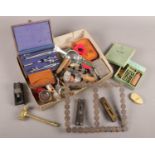 A box of collectables. Includes Farthing coin frame, sealing wax set, spirit level etc.