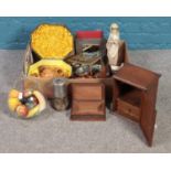 A box of assorted items. To include smokers cabinet, puzzle box and miners lamp by the Wolf Safety
