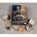 A box of metalwares. Includes Old Hall wine holder, boxed Tankards, cutlery etc.