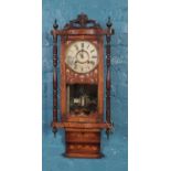 A mahogany Vienna 8 day wall clock with inlay detailing. (with key and pendulum) works