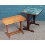 A light oak occasional table, together with collapsible mahogany side tables with the top composed