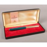 A Parker fountain pen. Gold plated lid. boxed with cartridges.