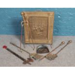 A Brass fire screen, together with companion set and decorative axe with mahogany turned handle.