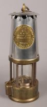 An Eccles Type SL Miners Safety Lamp, makers stamp has been left blank.