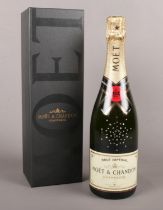 A Moet & Chandon Champagne crystallized with Swaroski. (boxed)