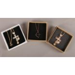 Three boxed Harlem Carter necklaces. A Silver gilt necklace with a cupid bow and arrow and two