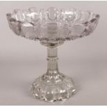 A large Victorian cut glass pedestal cake stand. Damage to top of pedestal, piece missing.