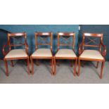 Eight yewood dining chairs including two carvers.