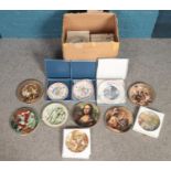 A box of cabinet plates. Including Wedgwood Wind in the Willows examples, etc.