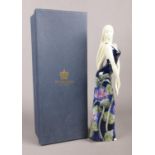 A boxed Old Tupton ware hand-painted porcelain figure of a young lady. H: 34cm.