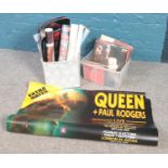 Two boxes of records and music posters. Includes original concert posters and press photos from