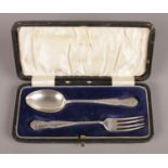 A cased silver baby's fork and spoon. Assayed for Birmingham, 1924, by Joseph Gloster Ltd. Total
