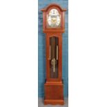 A yew wood grandmother clock, dial signed Thomas Byrne.